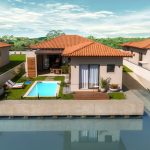Casas modernas com varanda e vista para o mar no empreendimento náutico de Búzios.